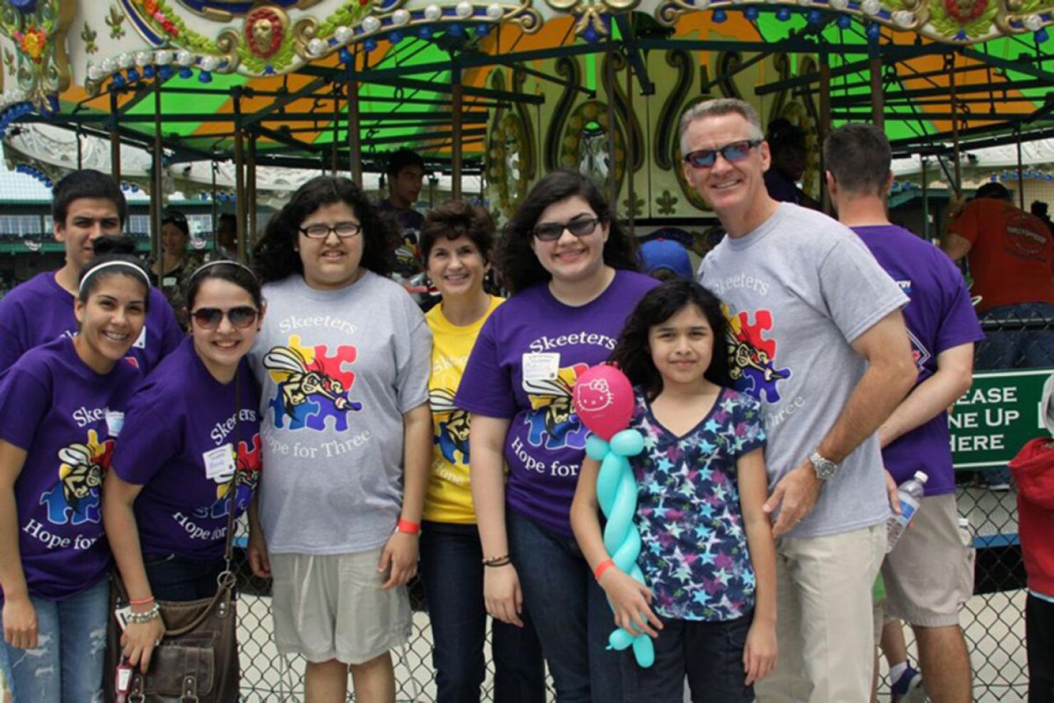 Rangeland President Chris Keene with participants in “Strike Out” Autism, Hope for Three’s annual key awareness and fundraising event held in conjunction with the Sugarland Skeeters Baseball Club. Rangeland is a sponsor of the event.
